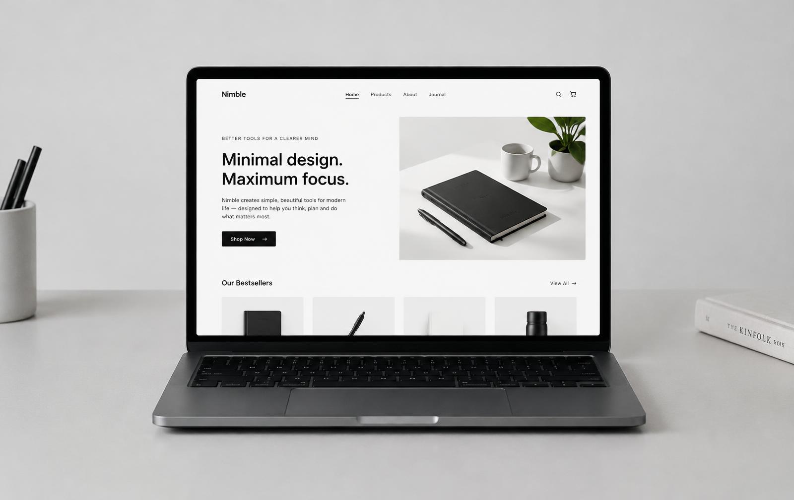 Spear website shown on a laptop